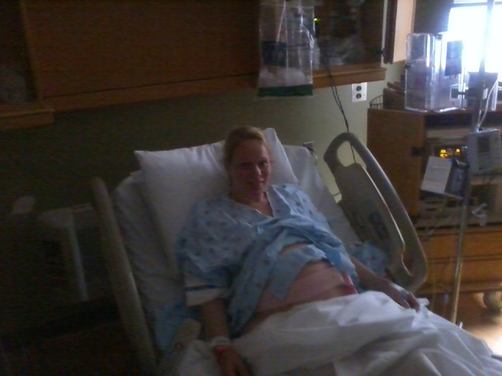 Abby Theuring, The Badass Breastfeder, laboring in the hospital