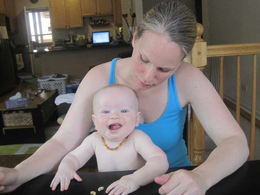 Abby Theuring, The Badass Breastfeeder with son. 