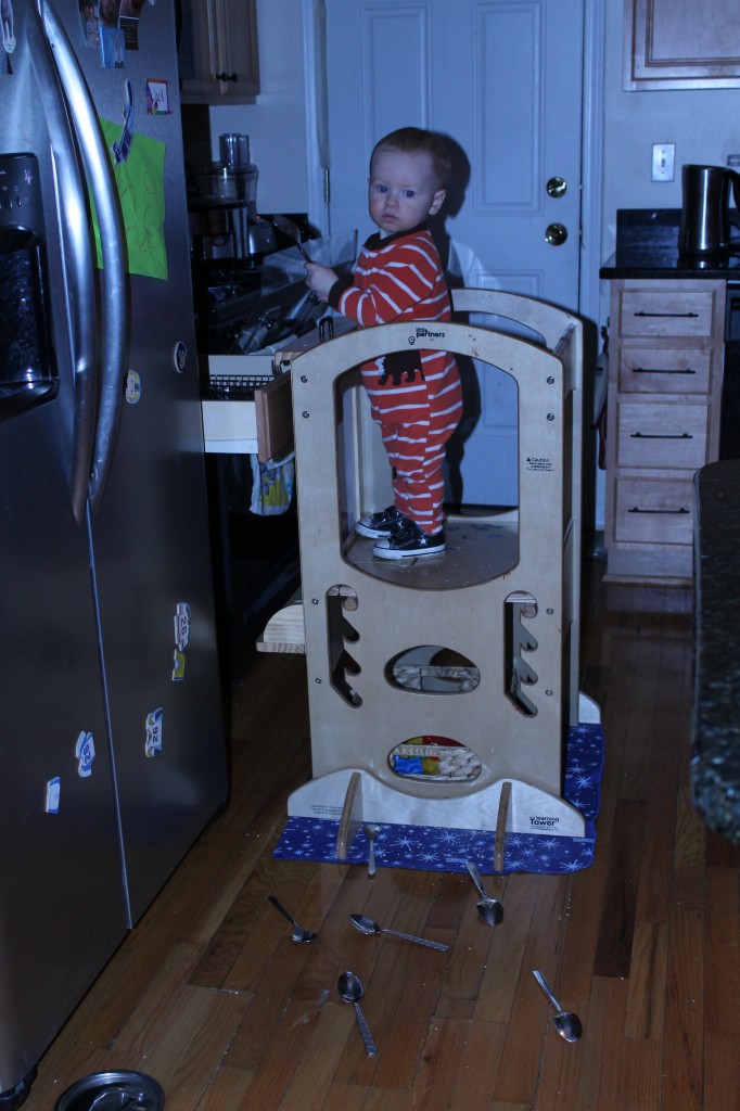 Abby Theuring, The Badass Breastfeeder's son on a learning tower. 