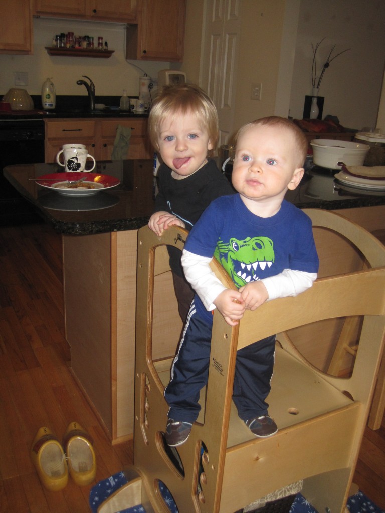 Abby Theuring, The Badass Breastfeeder's son on a learning tower. 