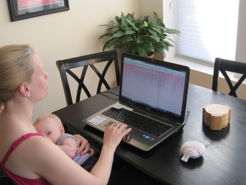 Abby Theuring, The Badass Breastfeeder, breastfeeding her son. 