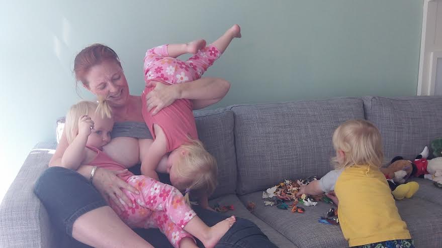 Davina breastfeeding her triplets 