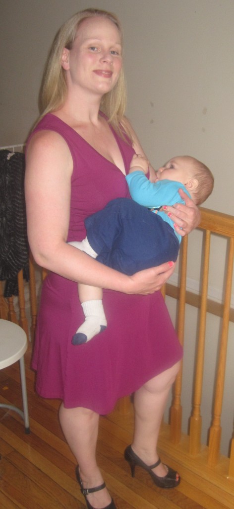 Abby Theuring, The Badass Breastfeeder, breastfeeding in a Momzelle nursing dress. 