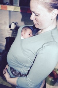 Abby Theuring, The Badass Breastfeeder wearing the NuRoo Pocket.