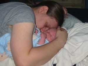 Danny Pitt Stoller with newborn