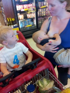 Abby Theuring, The Badass Breastfeeder, with sons at grocery store.