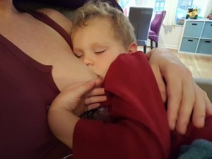 Abby Theuring, The Badass Breastfeeder, breastfeeding son to sleep.