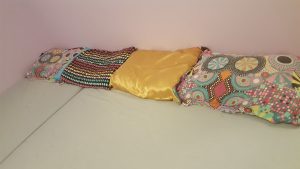 Abby Theuring, The Badass Breastfeeder's co-sleeping family bed