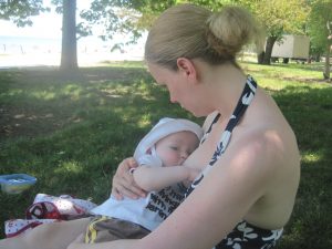 Abby Theuring, The Badass Breastfeeder, breastfeeding while twiddling.