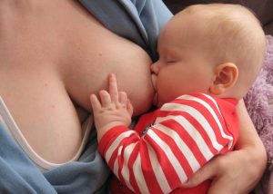 The Badass Breastfeeder, Abby Theuring and Jack, breastfeeding with perfect latch.